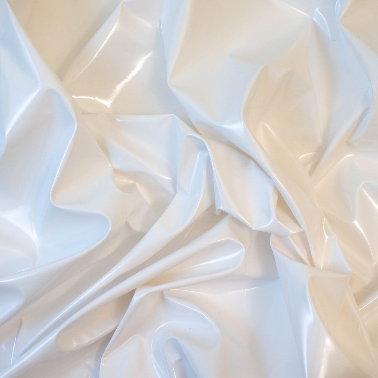 Tissu Stretch Brillant PVC Blanc - Étirement Naturel 1 Sens - Enduit PU