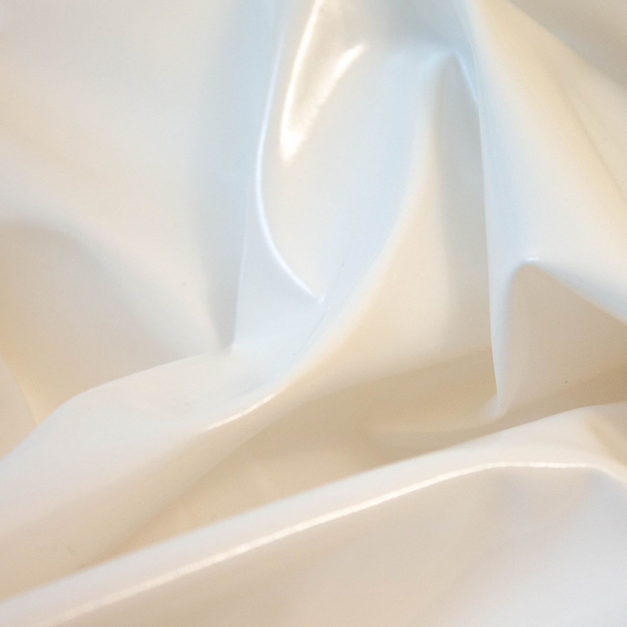 Tissu Stretch Brillant PVC Blanc - Étirement Naturel 1 Sens - Enduit PU
